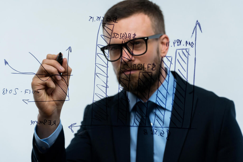 Man Draws Various Growth Charts Calculating 1024x683